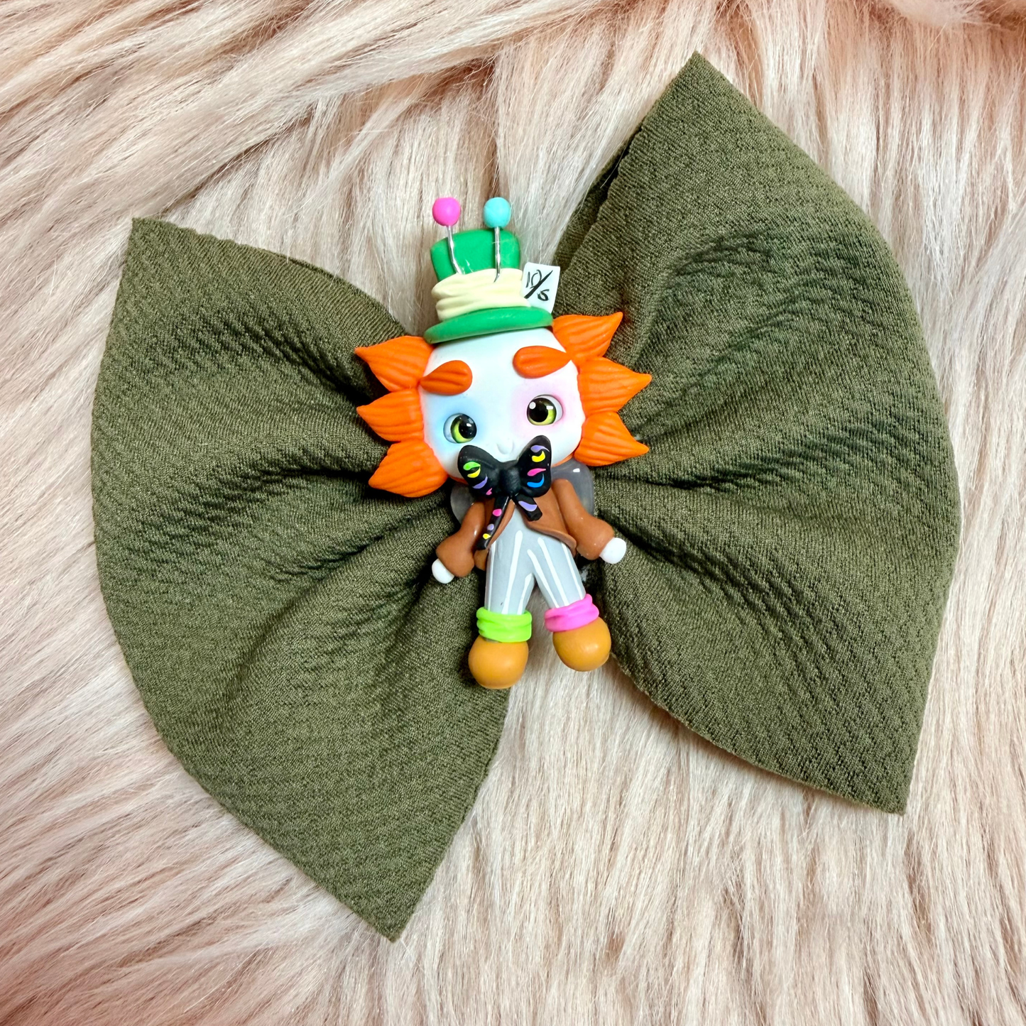 Savannah Bow - The Mad Hatter